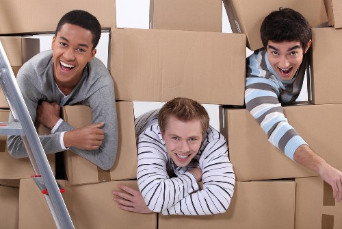 Furniture removals team handling a sofa move in Elephant and Castle