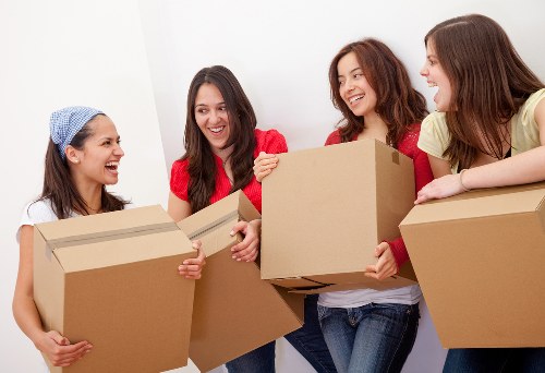 Careful loading of boxes and furniture from a London apartment block