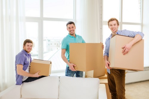 Careful loading of household furniture into a removals van